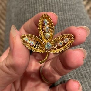 Vintage gold metal brooch coiled made in Austria rhinestone brooch